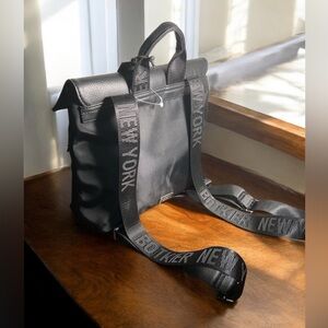 Botkier  Designer women’s backpack logo embossed Botkier New York wide straps